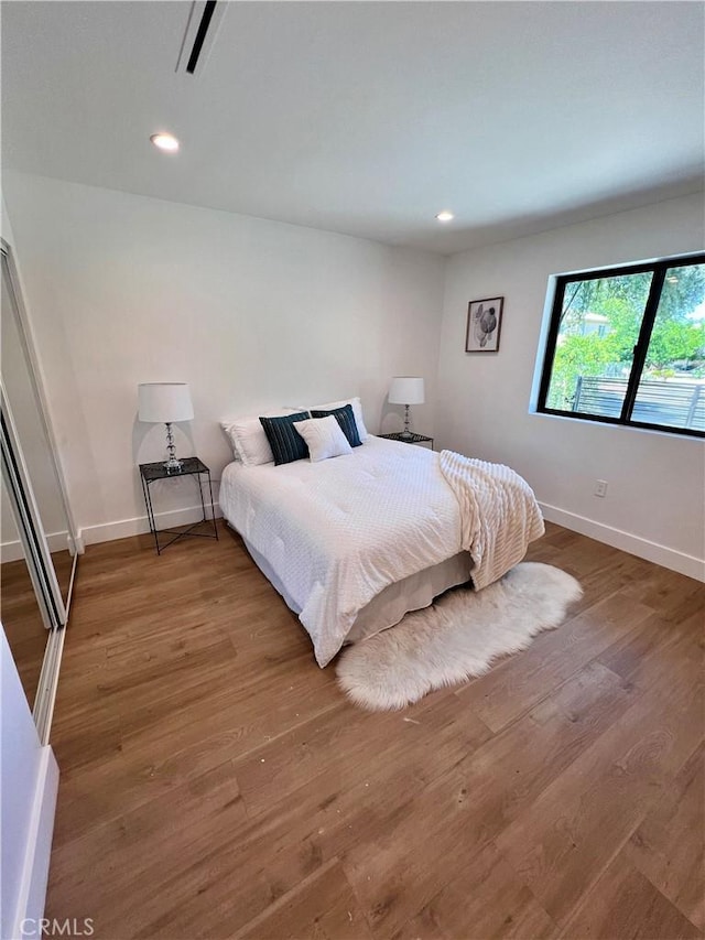 6829 Yolanda Ave, Reseda, CA 91335 - bedroom featuring wood finished floors, baseboards, and recessed lighting