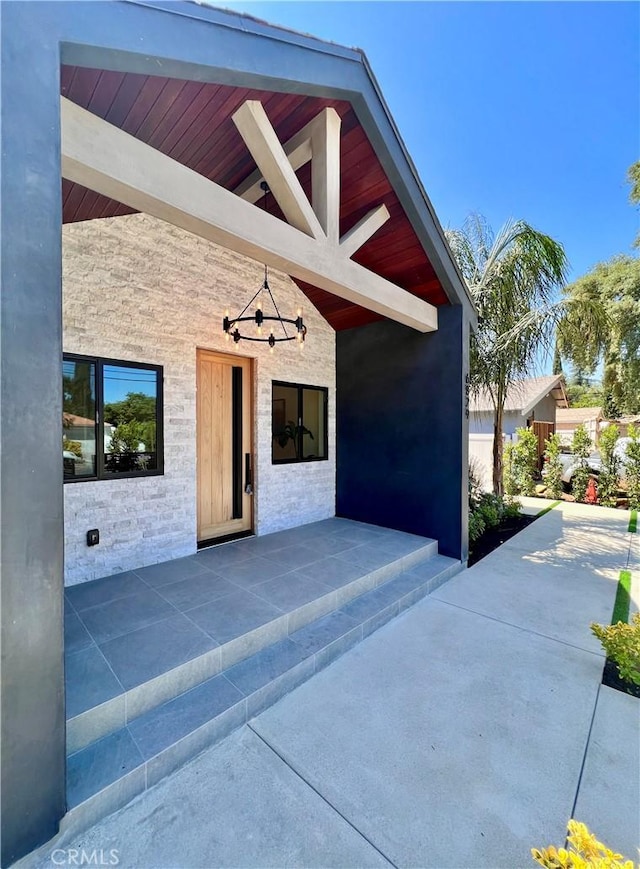6829 Yolanda Ave, Reseda, CA 91335 - entrance to property featuring stone siding and a patio area