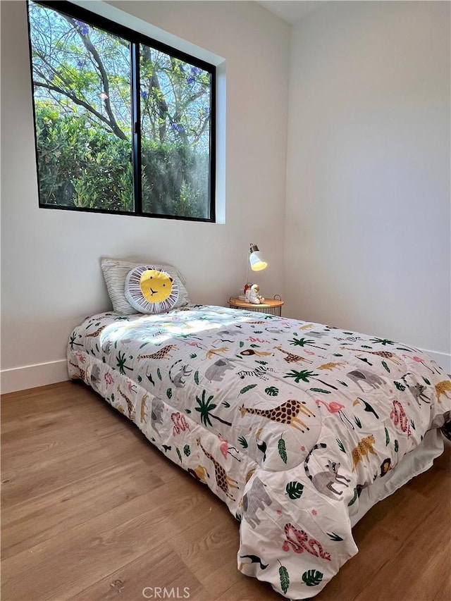 6829 Yolanda Ave, Reseda, CA 91335 - bedroom featuring wood finished floors and baseboards