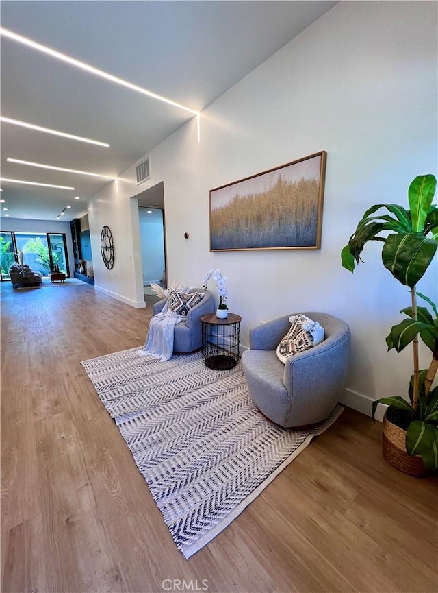 6829 Yolanda Ave, Reseda, CA 91335 - living area featuring wood finished floors and baseboards