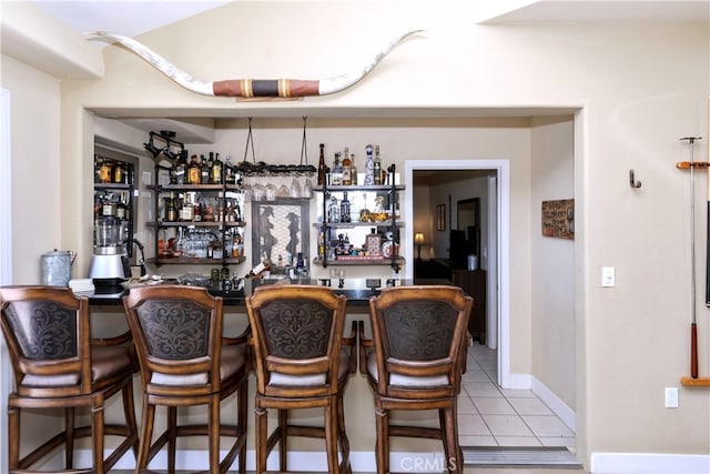 40125 Scanlon Rd, Temecula, CA 92592 - indoor wet bar featuring light tile patterned floors