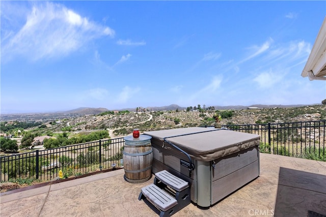 40125 Scanlon Rd, Temecula, CA 92592 - view of patio / terrace with a hot tub and a mountain view