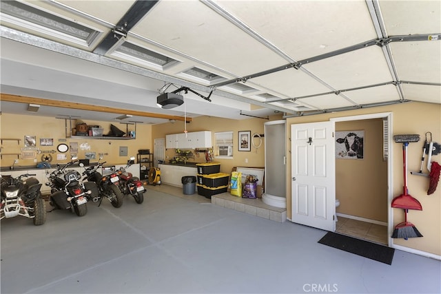40125 Scanlon Rd, Temecula, CA 92592 - garage featuring a garage door opener