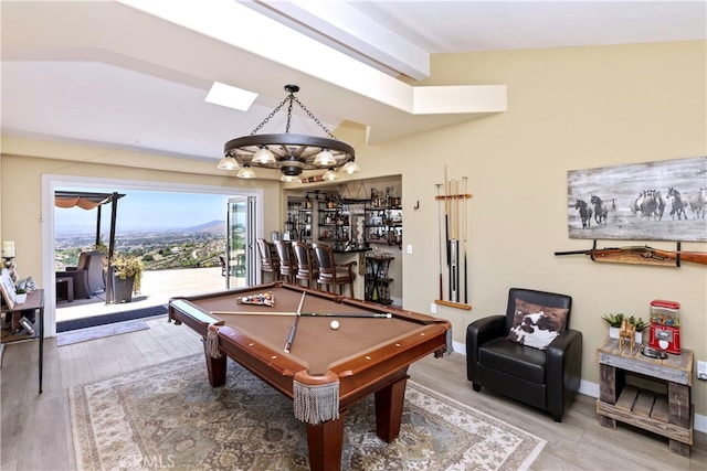 40125 Scanlon Rd, Temecula, CA 92592 - game room featuring a skylight, billiards, wood finished floors, a chandelier, and baseboards