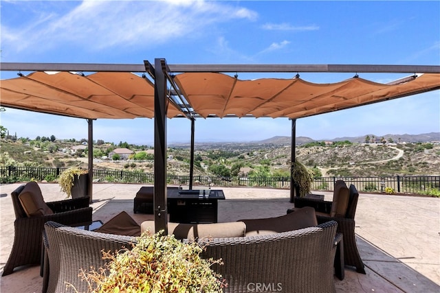 40125 Scanlon Rd, Temecula, CA 92592 - view of patio featuring a mountain view and an outdoor living space