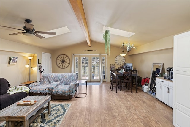 40125 Scanlon Rd, Temecula, CA 92592 - living area featuring light wood finished floors, french doors, a skylight, and a ceiling fan