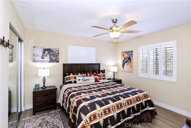 40125 Scanlon Rd, Temecula, CA 92592 - bedroom with wood finished floors, baseboards, and a ceiling fan