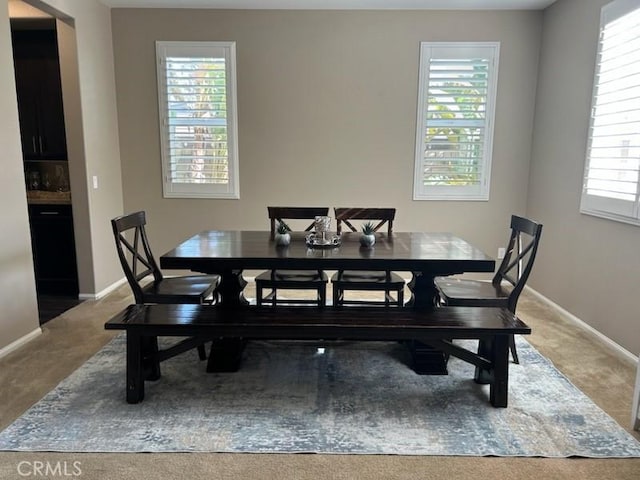 28626 Stonegate Ct, Valencia, CA 91354 - carpeted dining room with baseboards