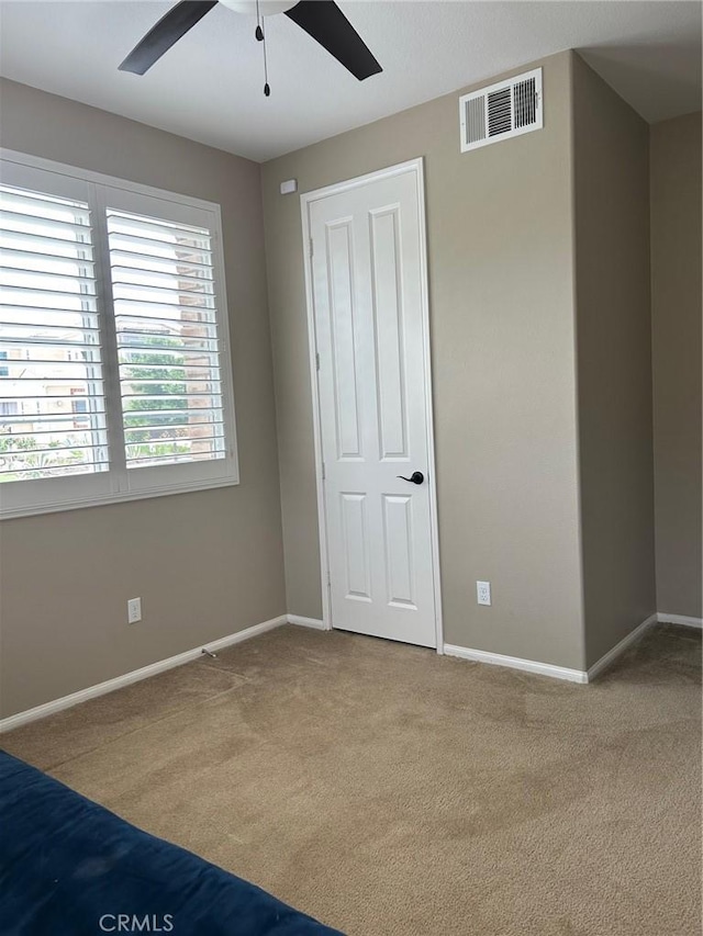 28626 Stonegate Ct, Valencia, CA 91354 - unfurnished bedroom with carpet, baseboards, and ceiling fan