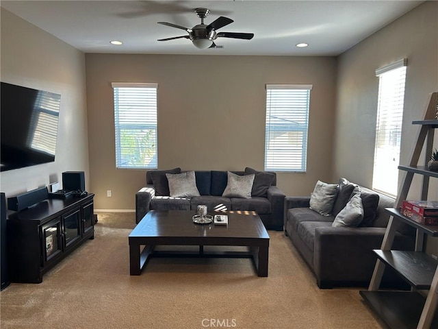 28626 Stonegate Ct, Valencia, CA 91354 - living room with light carpet, healthy amount of natural light, ceiling fan, recessed lighting, and baseboards