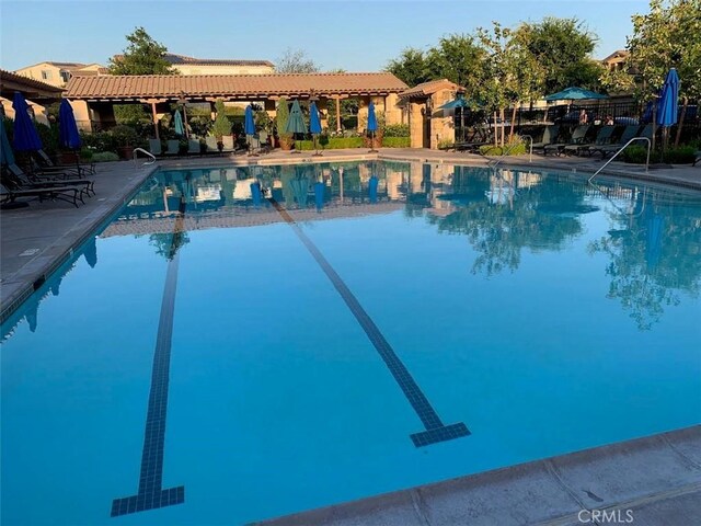 28626 Stonegate Ct, Valencia, CA 91354 - community pool featuring a patio area
