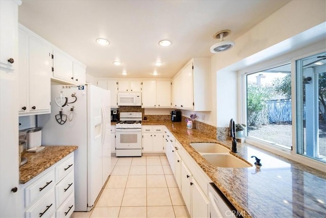 29870 Corte Cruzada, Menifee, CA 92584 - kitchen with white appliances, a sink, light stone countertops, white cabinetry, and recessed lighting
