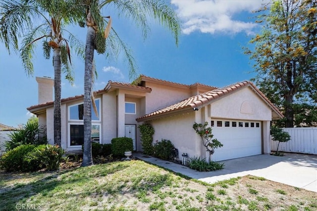 29870 Corte Cruzada, Menifee, CA 92584 - mediterranean / spanish home featuring concrete driveway, an attached garage, stucco siding, and a tile roof