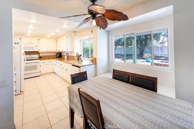 29870 Corte Cruzada, Menifee, CA 92584 - dining space featuring light tile patterned floors, ceiling fan, and recessed lighting