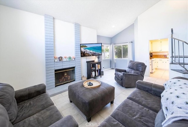 29870 Corte Cruzada, Menifee, CA 92584 - living area featuring light tile patterned floors, a brick fireplace, and high vaulted ceiling