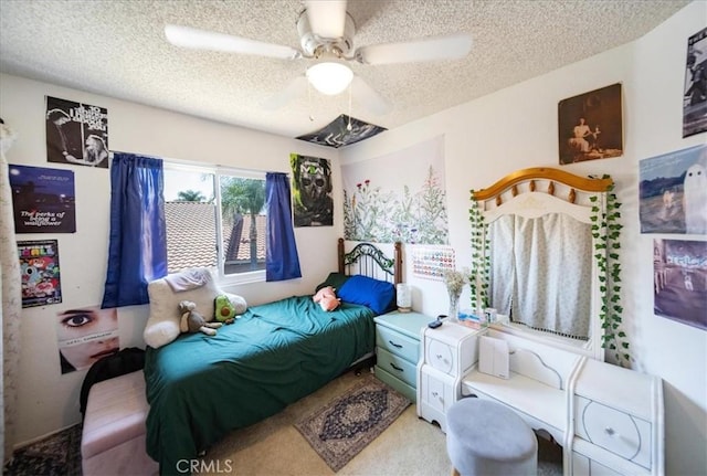 29870 Corte Cruzada, Menifee, CA 92584 - carpeted bedroom featuring a textured ceiling and ceiling fan