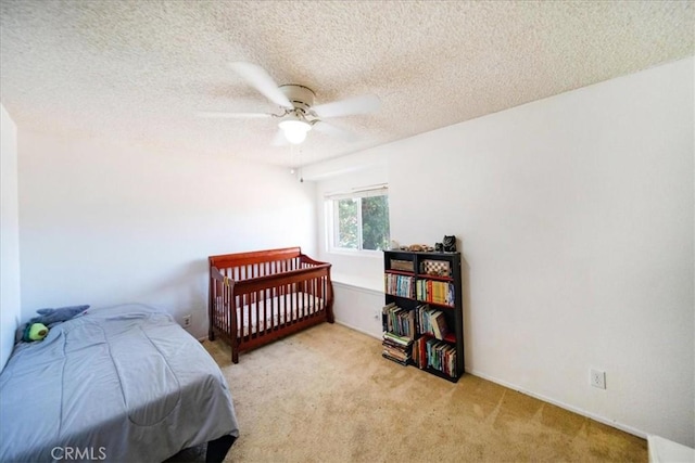 29870 Corte Cruzada, Menifee, CA 92584 - carpeted bedroom with a textured ceiling and ceiling fan