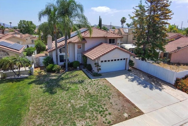 29870 Corte Cruzada, Menifee, CA 92584 - mediterranean / spanish home featuring a tile roof, stucco siding, an attached garage, concrete driveway, and solar panels