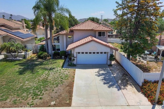 29870 Corte Cruzada, Menifee, CA 92584 - mediterranean / spanish-style house featuring a tile roof, stucco siding, concrete driveway, a garage, and a mountain view