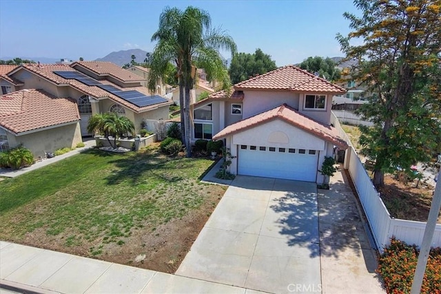 29870 Corte Cruzada, Menifee, CA 92584 - mediterranean / spanish house with a tiled roof, stucco siding, driveway, a garage, and a mountain view