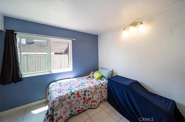 29870 Corte Cruzada, Menifee, CA 92584 - bedroom featuring light tile patterned floors
