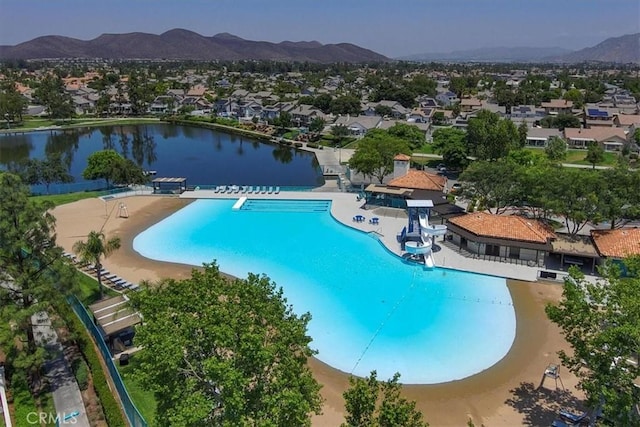 29870 Corte Cruzada, Menifee, CA 92584 - community pool featuring a residential view and a water and mountain view