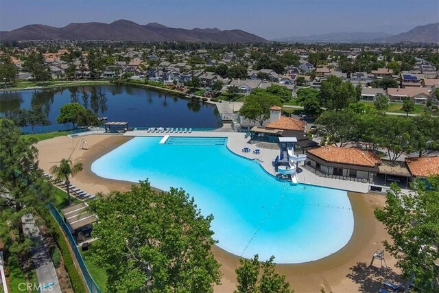 29870 Corte Cruzada, Menifee, CA 92584 - community pool featuring a residential view and a water and mountain view