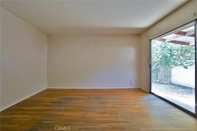 2306 S Encina St, Visalia, CA 93277 - empty room with wood finished floors and baseboards
