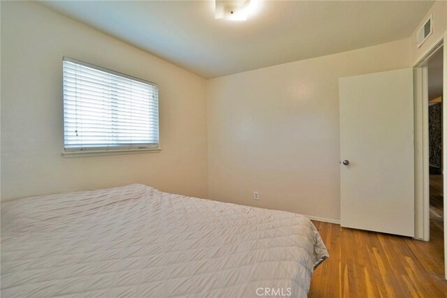 2306 S Encina St, Visalia, CA 93277 - bedroom with wood finished floors