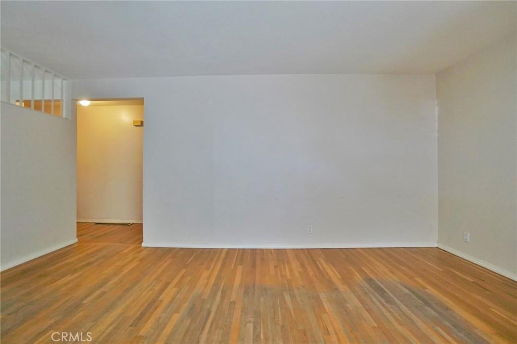 2306 S Encina St, Visalia, CA 93277 - unfurnished room featuring wood finished floors and baseboards