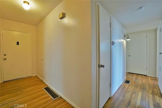 2306 S Encina St, Visalia, CA 93277 - hallway featuring wood finished floors and baseboards