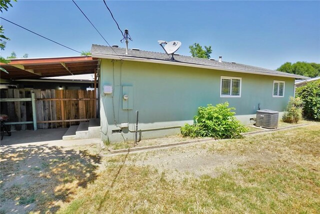 2306 S Encina St, Visalia, CA 93277 - rear view of house with central AC