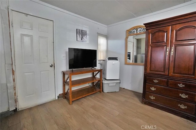 2306 S Encina St, Visalia, CA 93277 - bedroom with light wood-style flooring and ornamental molding