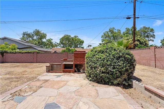 11747 Hollyview Dr, La Mirada, CA 90638 - fenced backyard featuring a patio