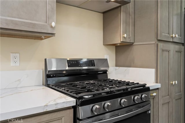 11747 Hollyview Dr, La Mirada, CA 90638 - kitchen featuring gas stove and light stone countertops