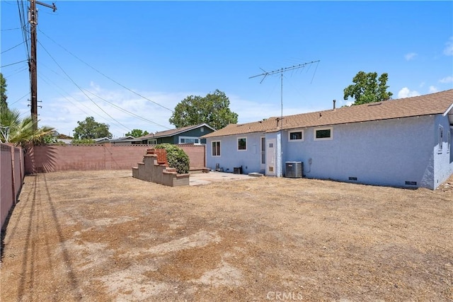 11747 Hollyview Dr, La Mirada, CA 90638 - rear view of property with cooling unit, a fenced backyard, a patio area, crawl space, and stucco siding