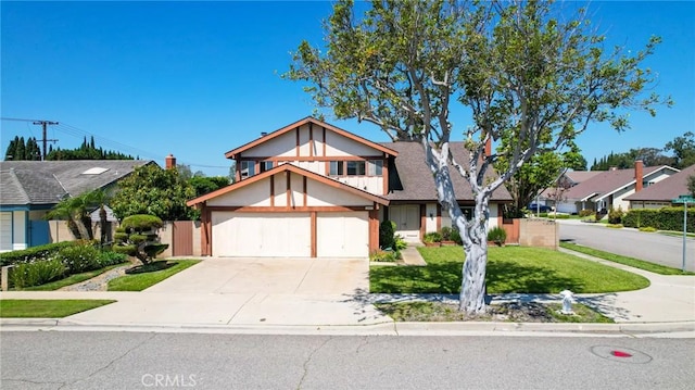18471 Santa Isadora St, Fountain Valley, CA 92708 - view of front of home featuring driveway, a front yard, and an attached garage