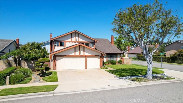 18471 Santa Isadora St, Fountain Valley, CA 92708 - tudor house featuring driveway, a front yard, stucco siding, and a chimney