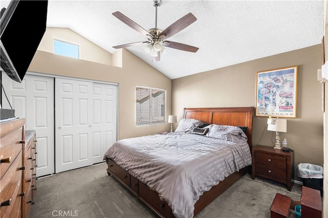 37940 42nd St E Unit 115, Palmdale, CA 93552 - carpeted bedroom featuring vaulted ceiling, a closet, a textured ceiling, and a ceiling fan