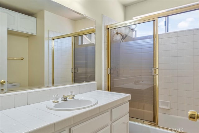 25455 Hardy Pl, Stevenson Ranch, CA 91381 - bathroom with toilet, vanity, and combined bath / shower with glass door