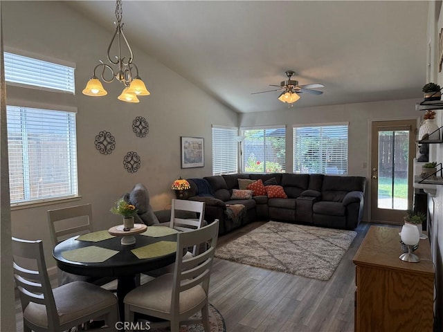 1438 Tumbleweed Ct, Oakdale, CA 95361 - dining space featuring lofted ceiling, wood finished floors, ceiling fan, and a chandelier