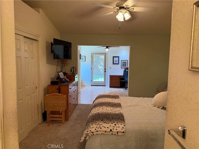 1438 Tumbleweed Ct, Oakdale, CA 95361 - bedroom with access to outside, ceiling fan, and light colored carpet