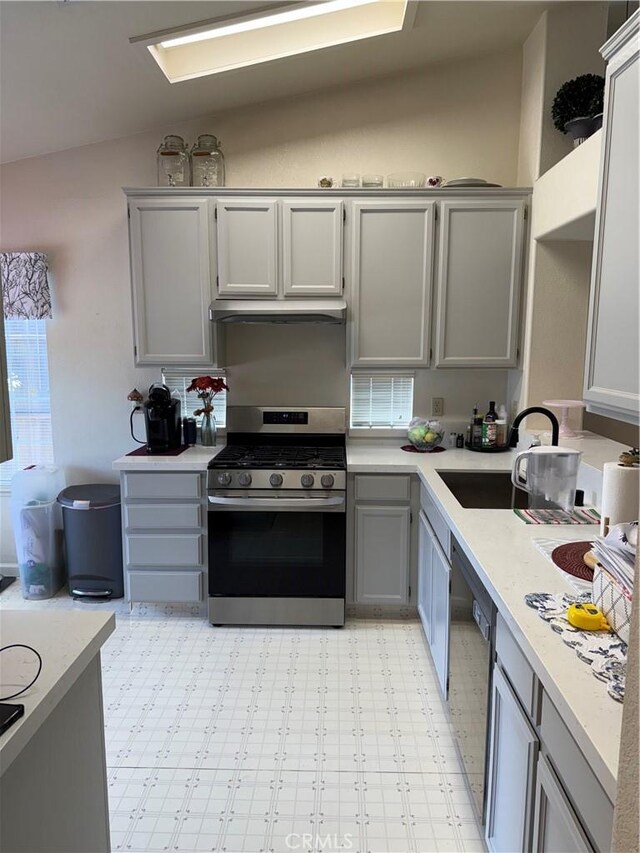 1438 Tumbleweed Ct, Oakdale, CA 95361 - kitchen featuring gas stove, gray cabinets, and light countertops