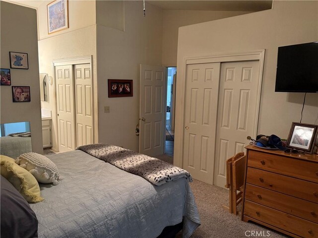 1438 Tumbleweed Ct, Oakdale, CA 95361 - bedroom with carpet flooring, a closet, and lofted ceiling