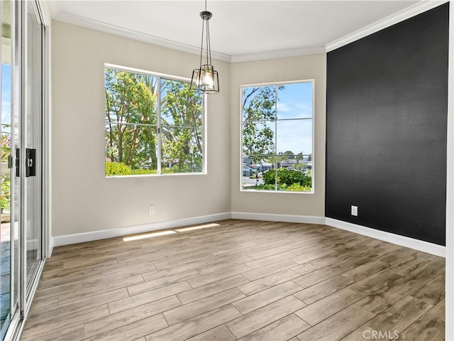 2 Vista Del Mar, Dana Point, CA 92629 - spare room featuring wood finished floors, crown molding, and a chandelier