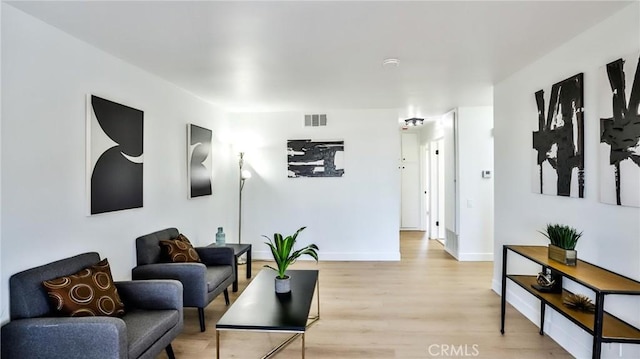 23331 Caminito Basilio Unit 348, Laguna Hills, CA 92653 - living area with light wood finished floors and baseboards