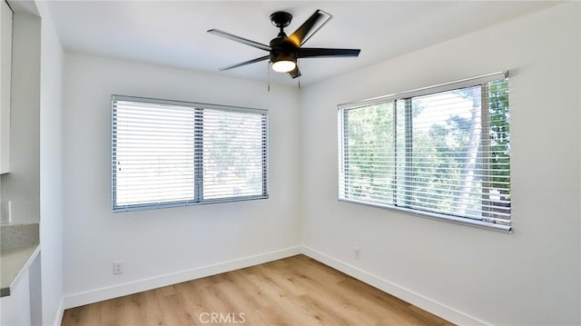 23331 Caminito Basilio Unit 348, Laguna Hills, CA 92653 - unfurnished room with baseboards, light wood-type flooring, and ceiling fan