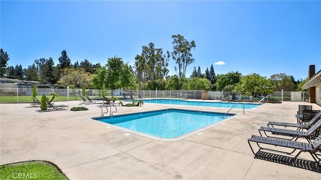 23331 Caminito Basilio Unit 348, Laguna Hills, CA 92653 - community pool with a patio area and view of scattered trees