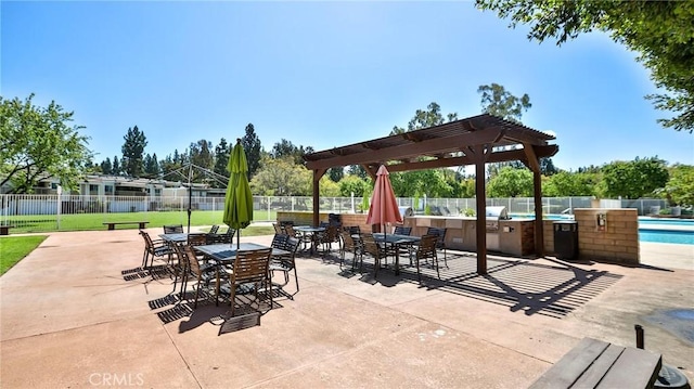 23331 Caminito Basilio Unit 348, Laguna Hills, CA 92653 - view of patio / terrace with a community pool and a pergola