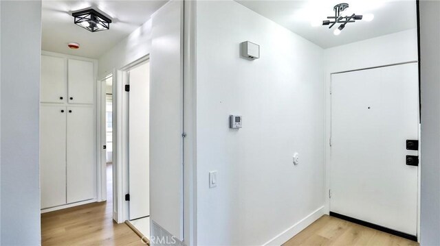 23331 Caminito Basilio Unit 348, Laguna Hills, CA 92653 - entryway with light wood finished floors